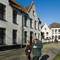 Tourists in the beguinage in Bruges, Belgium